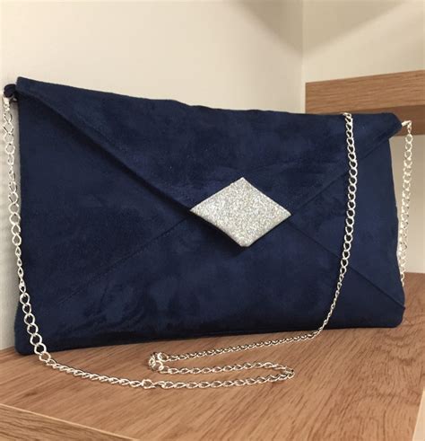 navy suede bag for wedding.